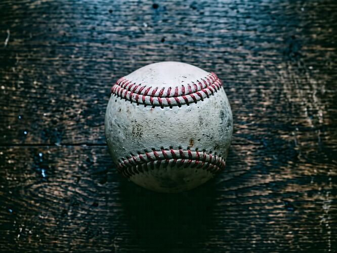 baseball on dark table